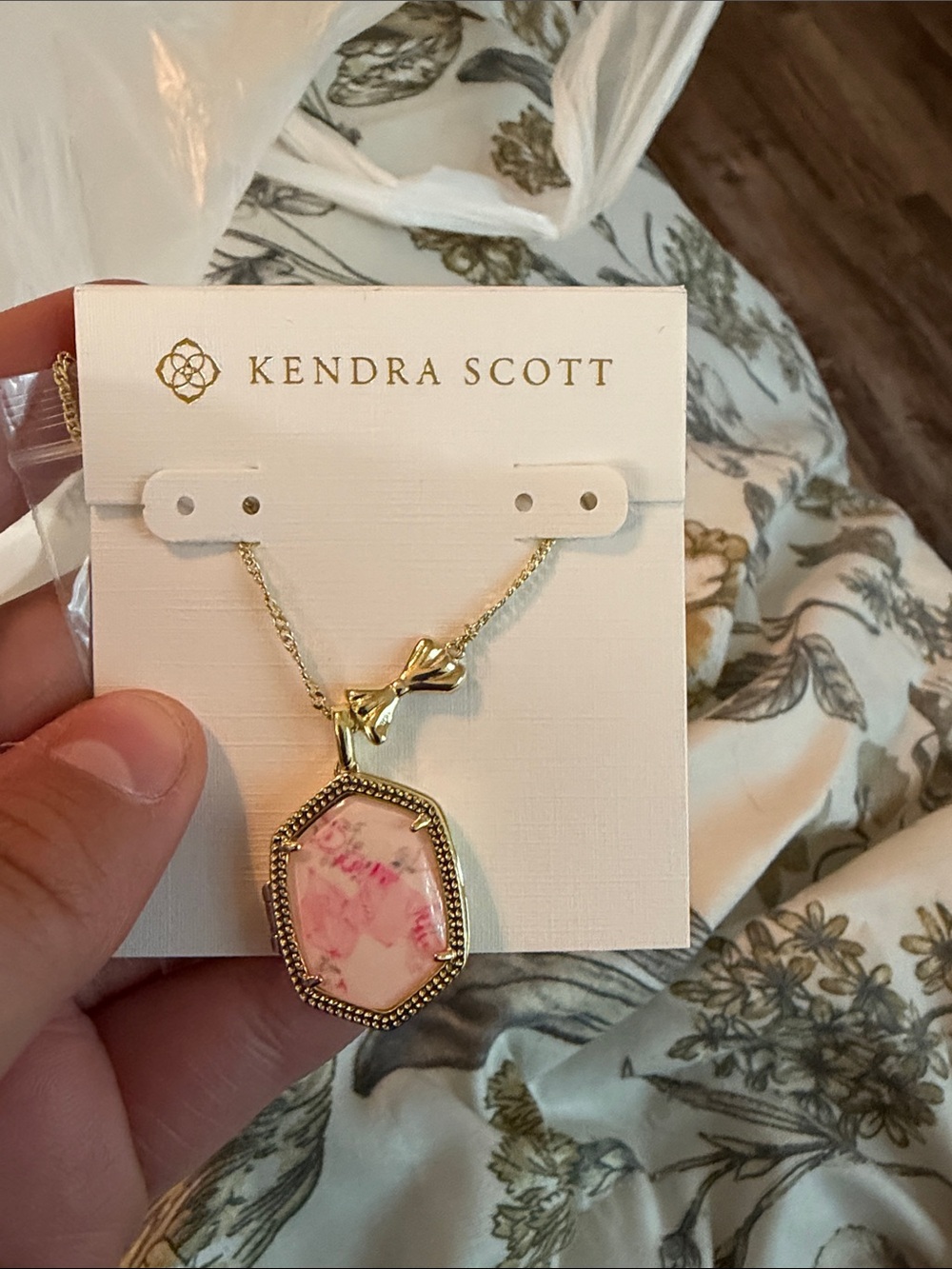 Kendra Scott Gold Necklace with Pink Marbled Pendant and Bow Accent